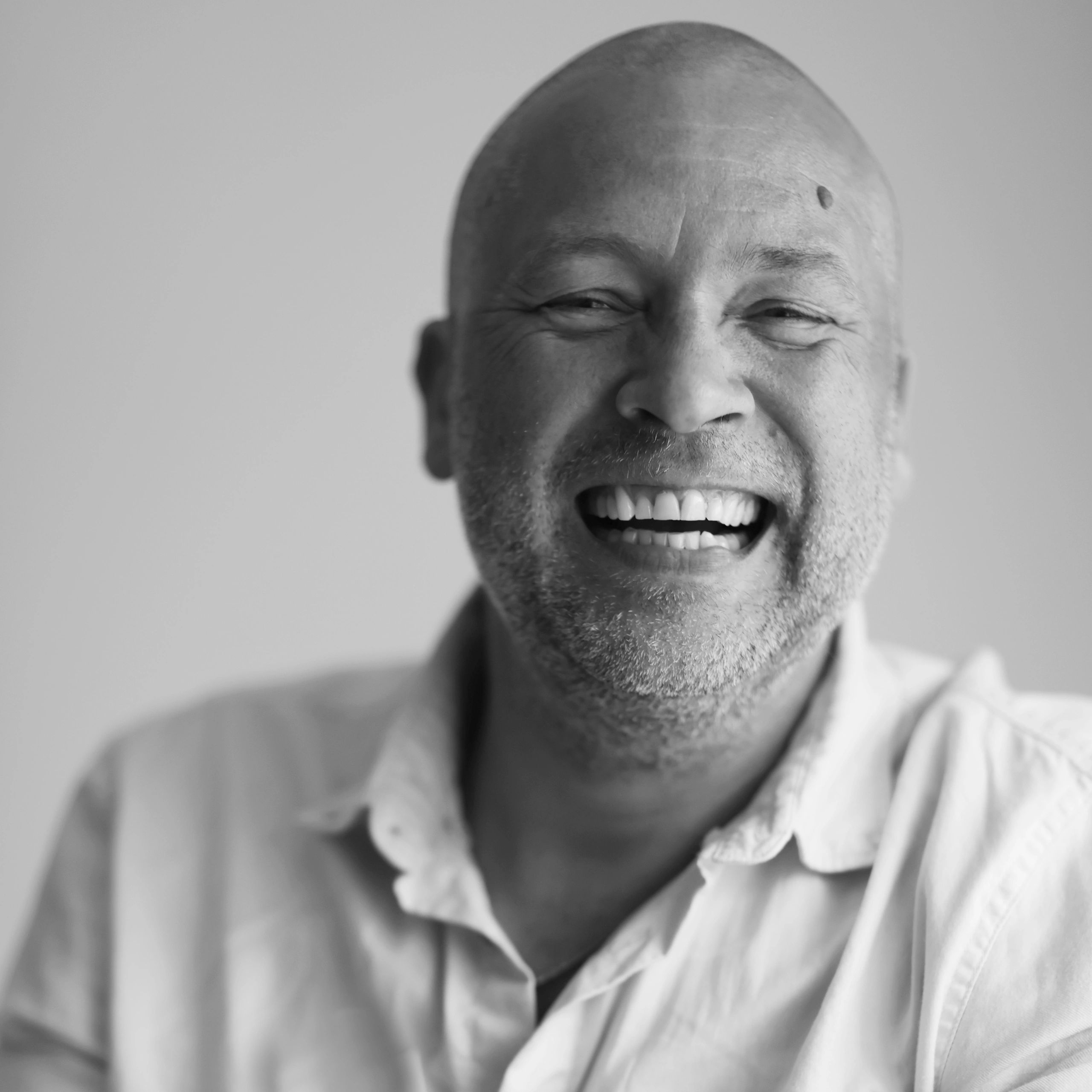 Portrait of a mature bald man smiling