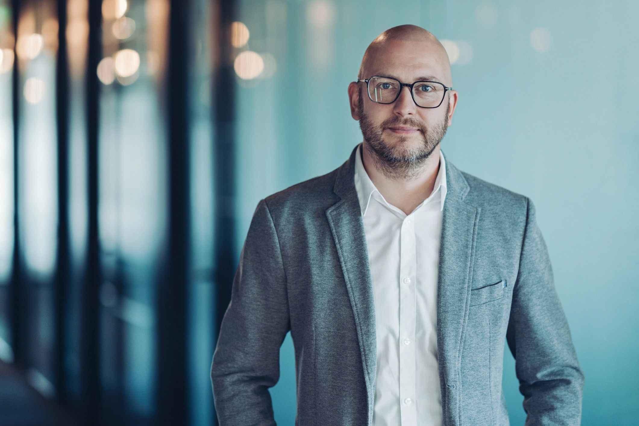 Portrait of a confident bald middle-aged businessman